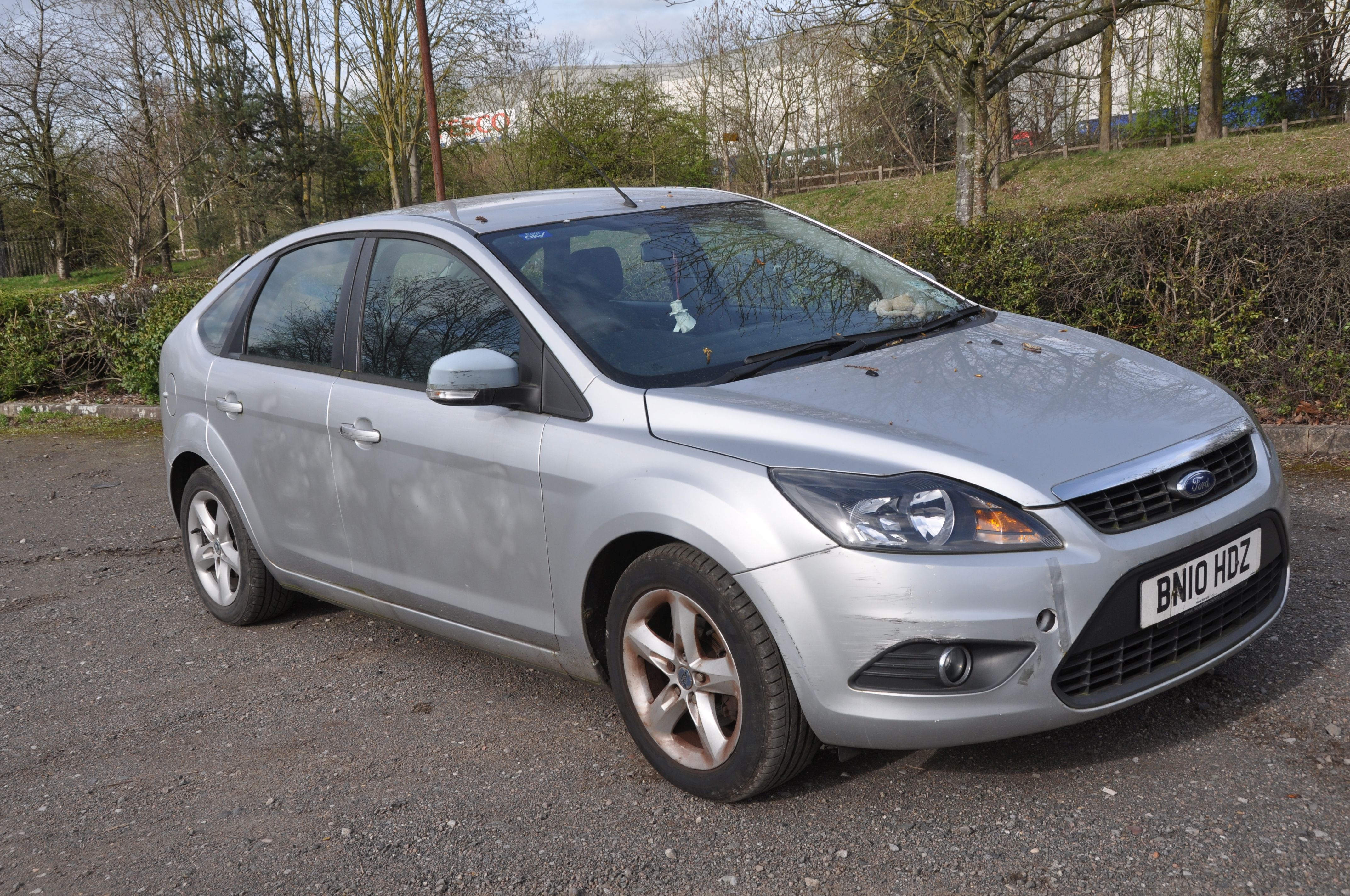 A 2010 FORD FOCUS ZETEC 100 5 door HATCHBACK in silver, first registered 23/07/2010 under number