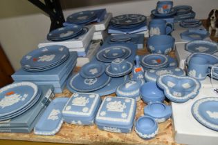 A QUANTITY OF WEDGWOOD JASPERWARE, in pale blue, comprising a teacup and saucer, a Christmas 1982