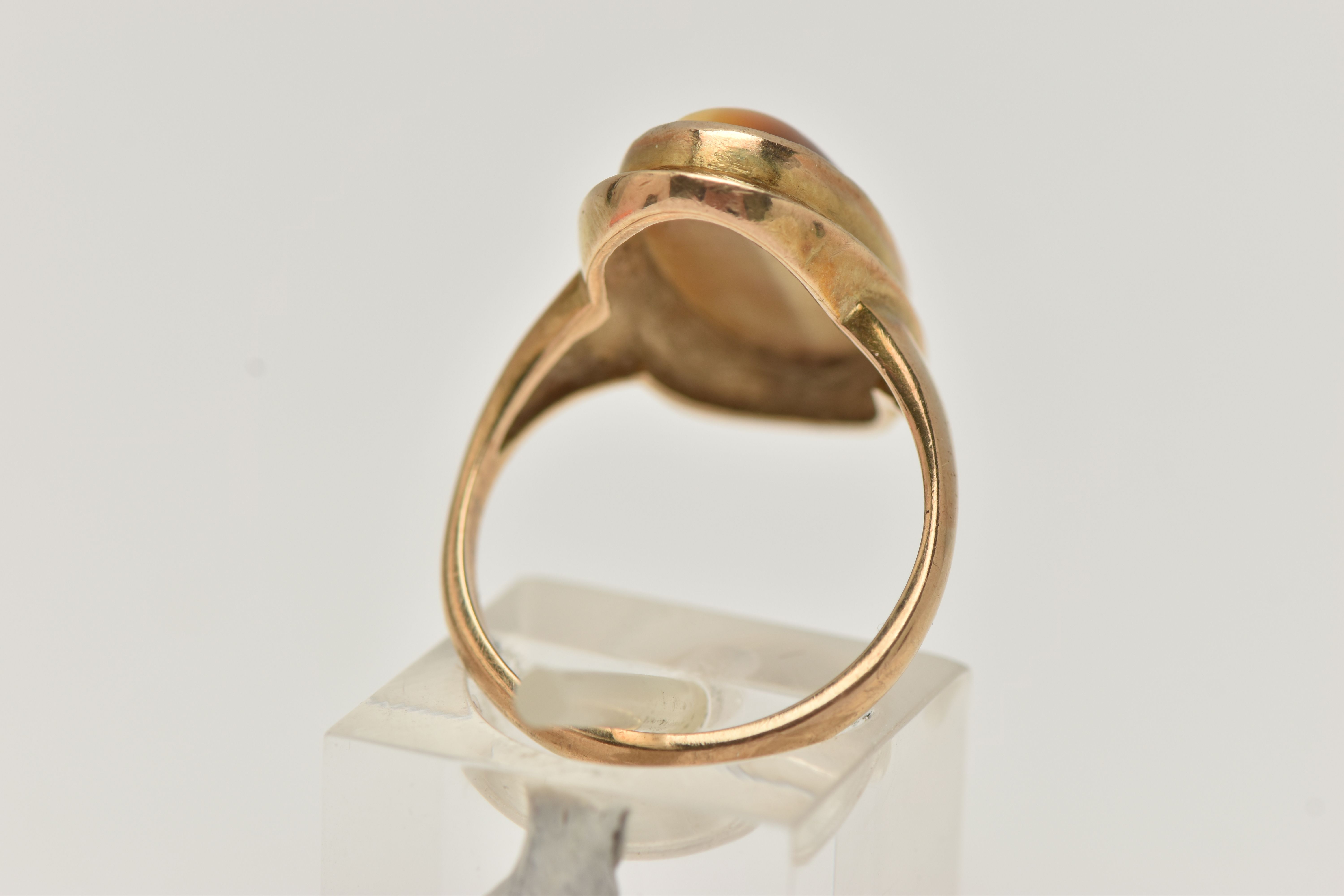A 9CT GOLD DRESS RING, an elongated oval cabochon tigers eye, collet set in yellow gold, leading - Image 3 of 5