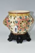 AN AUSTRIAN ZSOLNAY PECS PLANTER, florally decorated with a reticulated roundel on four sides,