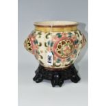 AN AUSTRIAN ZSOLNAY PECS PLANTER, florally decorated with a reticulated roundel on four sides,