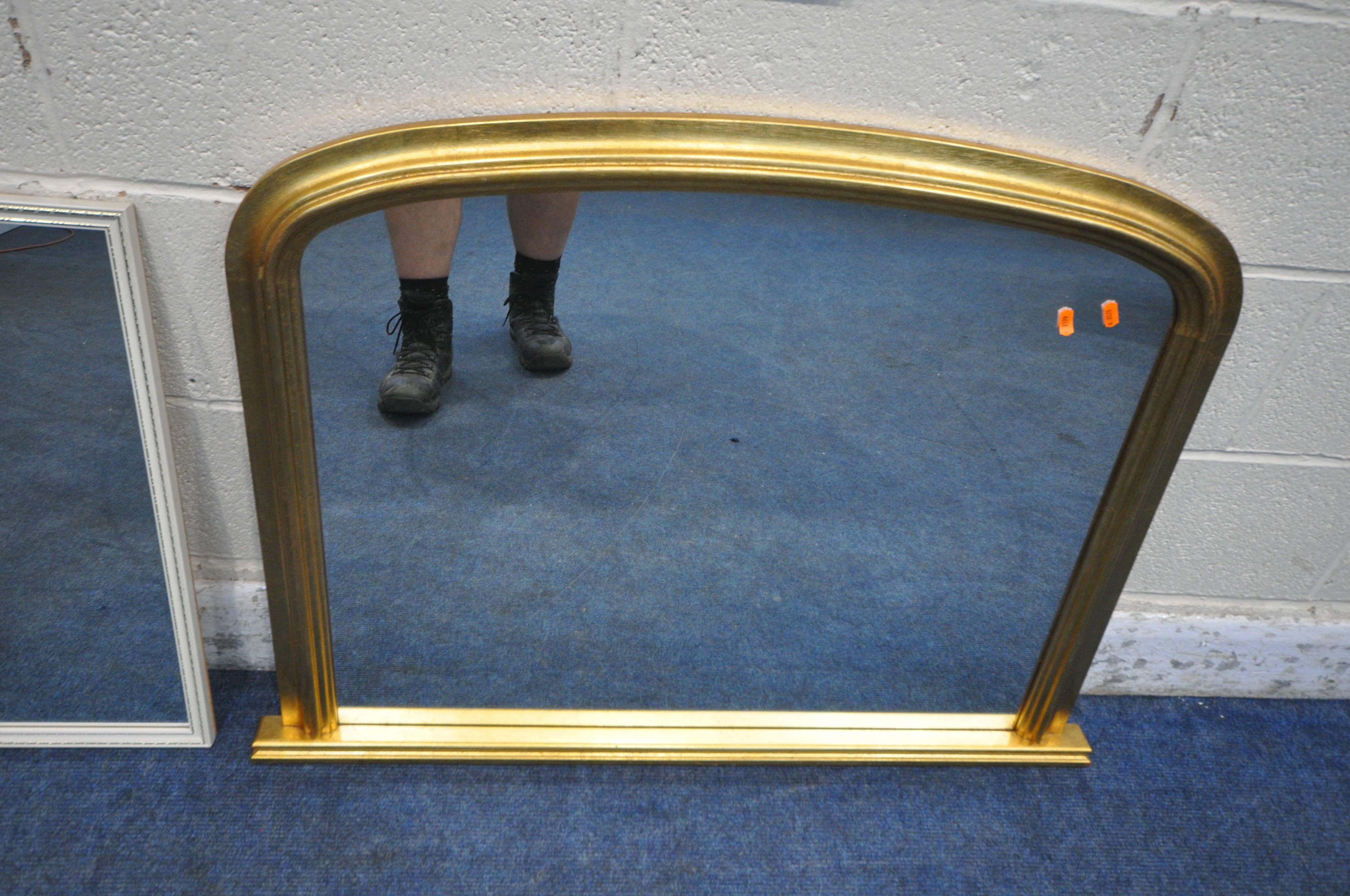 A GILT FRAMED ARCHED OVERMANTEL MIRROR, 98cm x 75cm, along with two small white mirrors (condition - Image 2 of 2