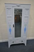 A 20TH CENTURY PAINTED OAK WARDROBE, with a single bevelled mirror door, above a single drawer,