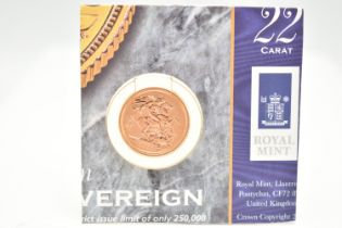 A ROYAL MINT CARDED HALF SOVEREIGN GOLD CARDED COIN 2000