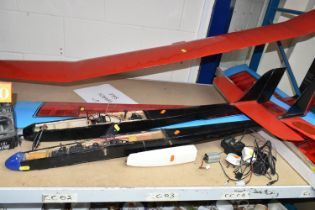 A SMALL QUANTITY OF REMOTE CONTROLLED AIRCRAFT EQUIPMENT, including two plane fuselages, a Sanwa