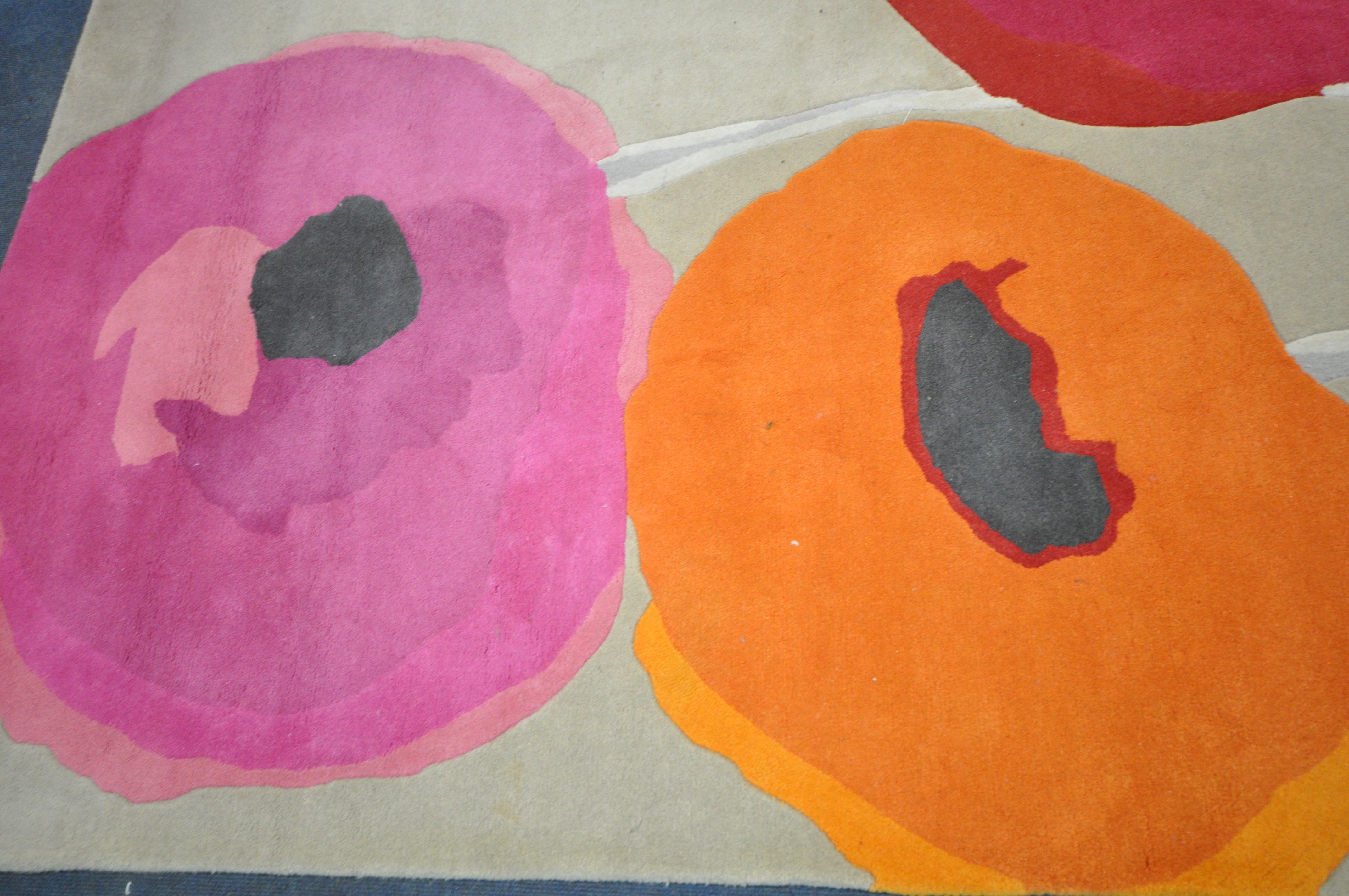 A SANDERSON WOOLEN RUG, with POPPIES-red/orange 45700 design 280cm x 200cm, along with a Made.com - Image 2 of 8