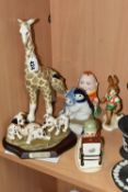 SIX ROYAL DOULTON, WADE, GOEBEL AND OTHER FIGURES, comprising a Royal Doulton 'Disney's 101