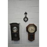 A 20TH CENTURY WALNUT ANSONIA REGULATOR WALL CLOCK, the octagonal face with a circular glass door,