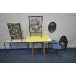 A YELLOW FORMICA DROP LEAF TABLE, two tubular metal stacking stools, two mirrors, two fire screens /