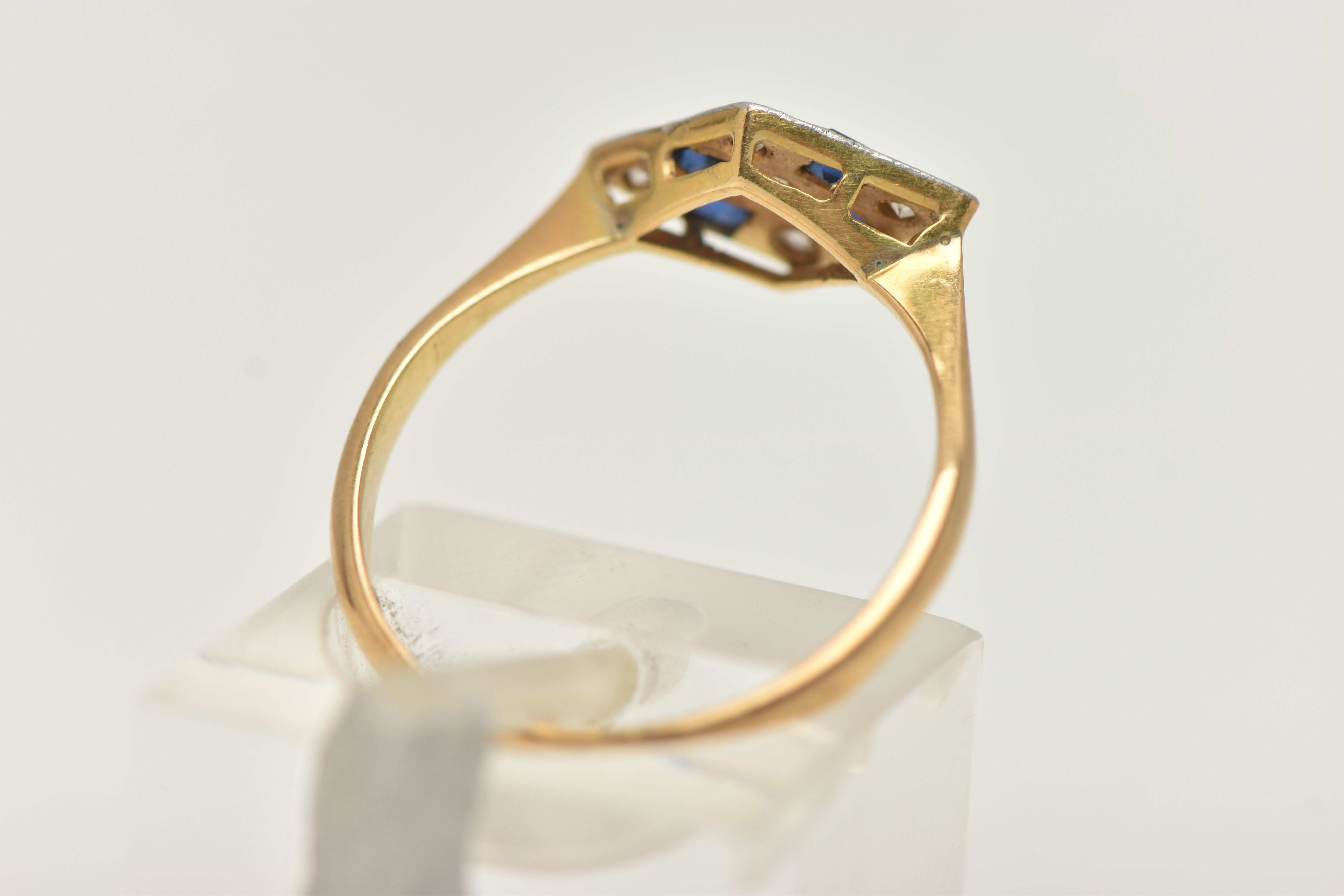 A LATE ART DECO SAPPHIRE AND DIAMOND RING, a rhombus form white metal mount, set with four square - Image 3 of 4