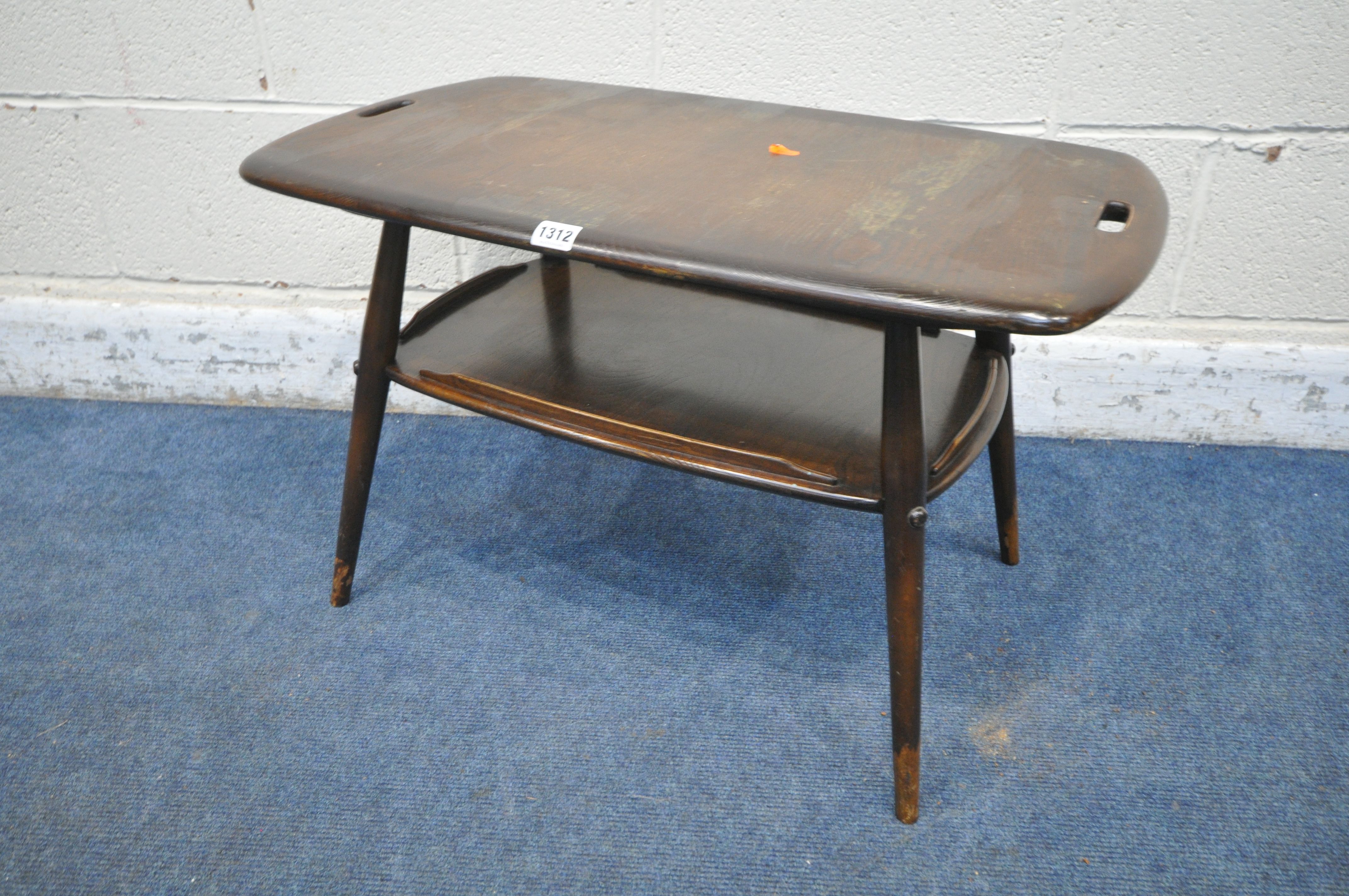 AN ELM AND BEECH DARK ERCOL TWO TIER BUTLERS TABLE, with twin handles, raised on cylindrical tapered