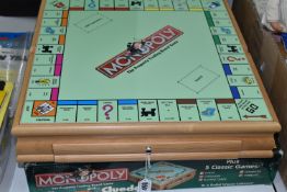 A BOXED PARKER WOODEN DOUBLE SIDED MONOPOLY AND CLUEDO BOARD WITH FIVE OTHER CLASSIC GAMES, (
