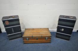 A METAL BANDED WOODEN TRUNK, with twin leather handles, width 101cm x depth 57cm x height 45cm,