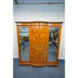 A LATE 19TH CENTURY SHERATON STYLE SATINWOOD AND MARQUETRY INLAID COMPACTUM WARDROBE, the two