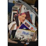 ONE BOX OF L.P AND SINGLE RECORDS, approximately one hundred L.P records to include artists Elvis,