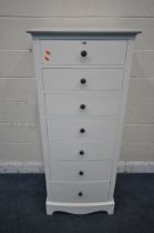 A TALL WHITE PAINTED BOWFRONT CHEST OF SEVEN GRADUATED DRAWERS, width 60cm x depth 50cm x height