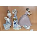 A GROUP OF SIX LLADRO AND NAO FIGURES, comprising 5120 'Girl In Pink Dress' (cracked and reglued
