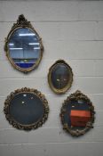 FOUR VARIOUS GILT WALL MIRRORS, two include a circular bevelled edge wall mirror, with foliate