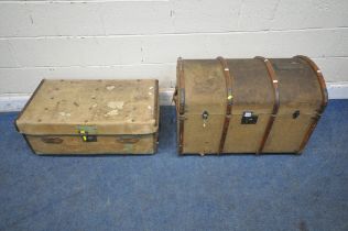 AN ATLAS DOMED CANVAS TRAVELING TRUNK, with wooden banding and twin leather handles, width 82cm x