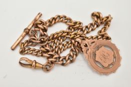 A ROSE METAL ALBERT CHAIN AND FOB MEDAL, graduated curb link chain, each link stamped 9ct, fitted