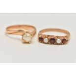 TWO GEM SET RINGS, the first a 9ct gold garnet and seed pearl five stone ring, scrolling detail to