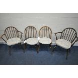 A PAIR OF ELM AND BEECH DARK ERCOL MODEL NUMBER 637 WINDSOR ARMCHAIRS, along with a pair of dark