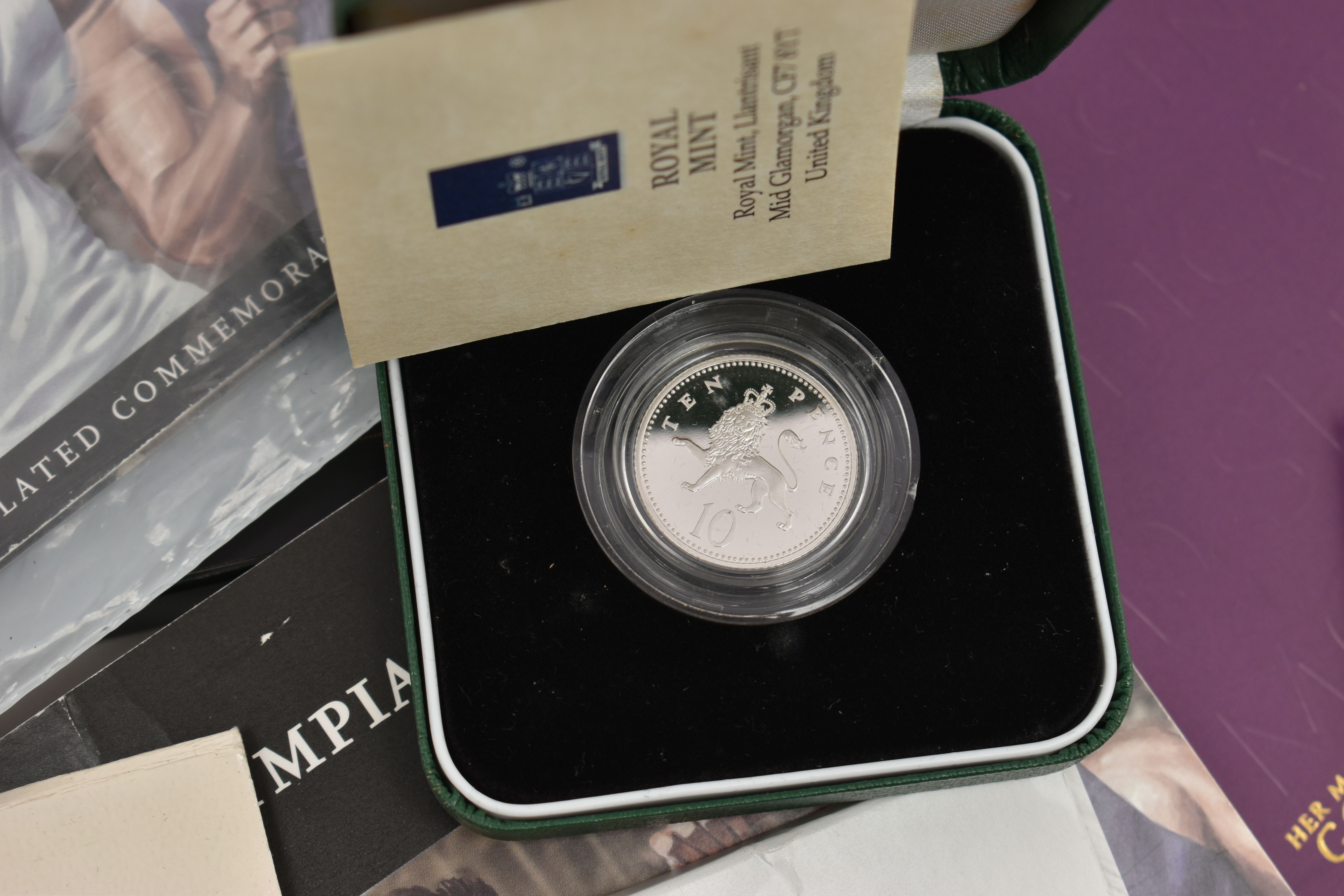 A RED BOX OF ROYAL MINT SILVER AND SILVER PROOF COINS TO INCLUDE 17 BRITANNIA COINS (Some with - Image 8 of 14