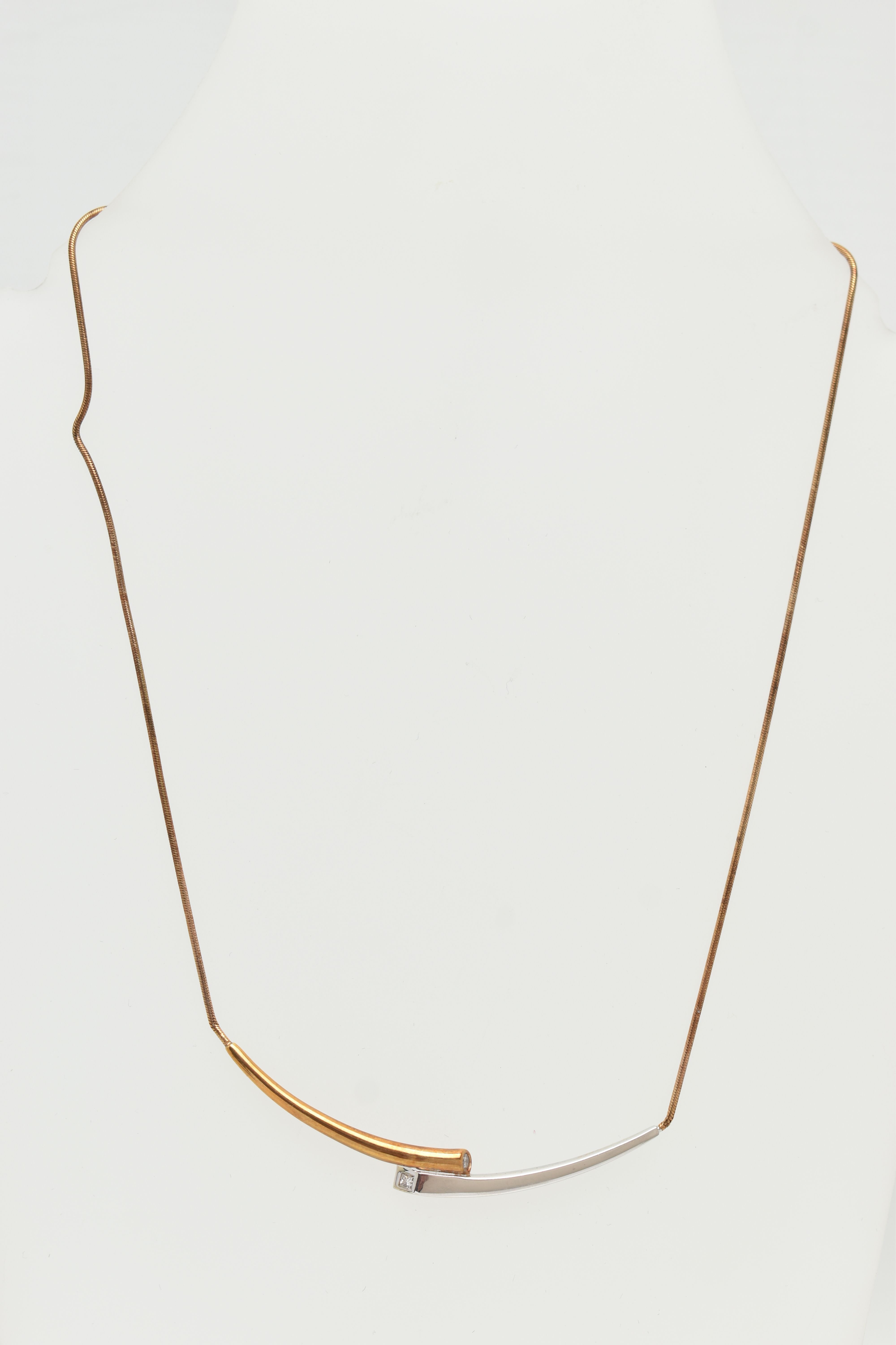 A 9CT GOLD 'ROYAL MINT' 'CONNECTIONS COLLARETTE' NECKLACE, a bicolor bypass style necklace, flush - Image 2 of 8