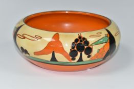 A CLARICE CLIFF FANTASQUE BIZARRE TREES & HOUSE PATTERN BOWL, the interior painted with orange and