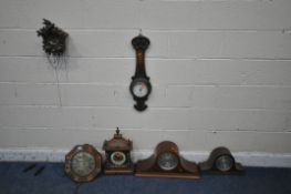 A 20TH CENTURY OAK MANTEL CLOCK, with three finials and brass mounts, another mantel clock, a mantel