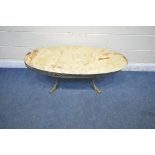 AN OVAL BRASS AND ONYX COFFEE TABLE, with foliate design, raised on oriental fish legs, length 127cm