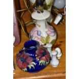 A GROUP OF MOORCROFT TABLE LAMPS AND VASE, comprising a 'Magnolia' design table lamp, pale pink