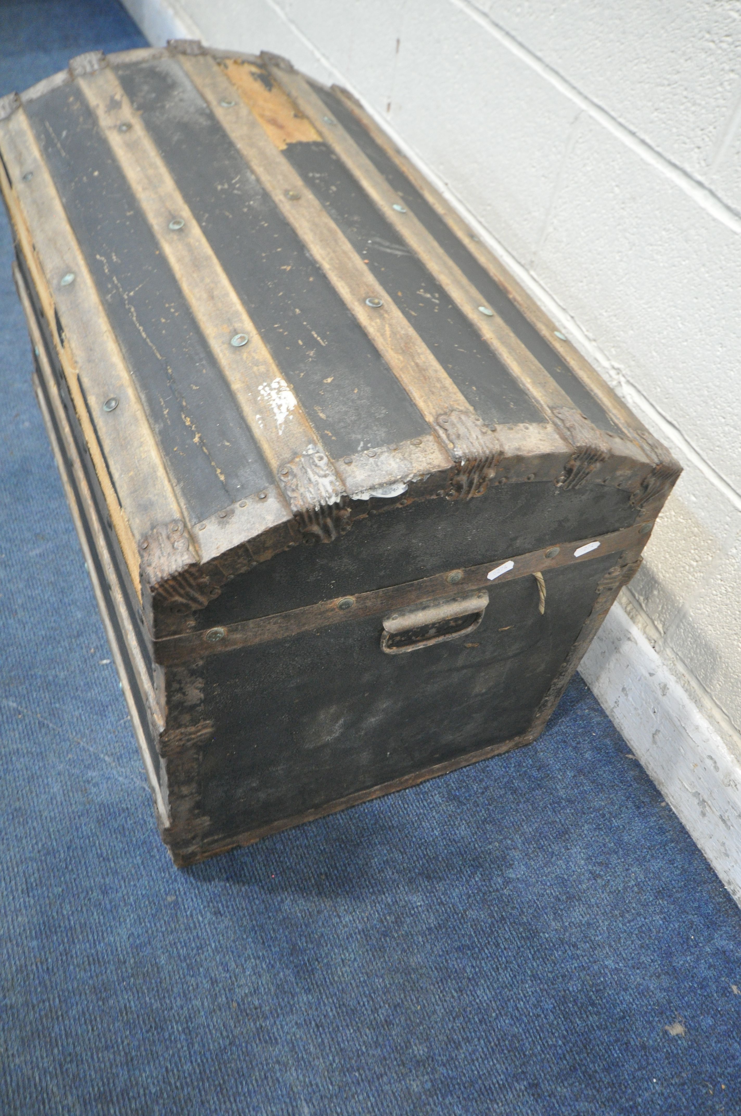 A DOMED TRAVELING TRUNK, with wooden and metal banding, twin handles and a hinged lid, width 77cm - Image 2 of 4