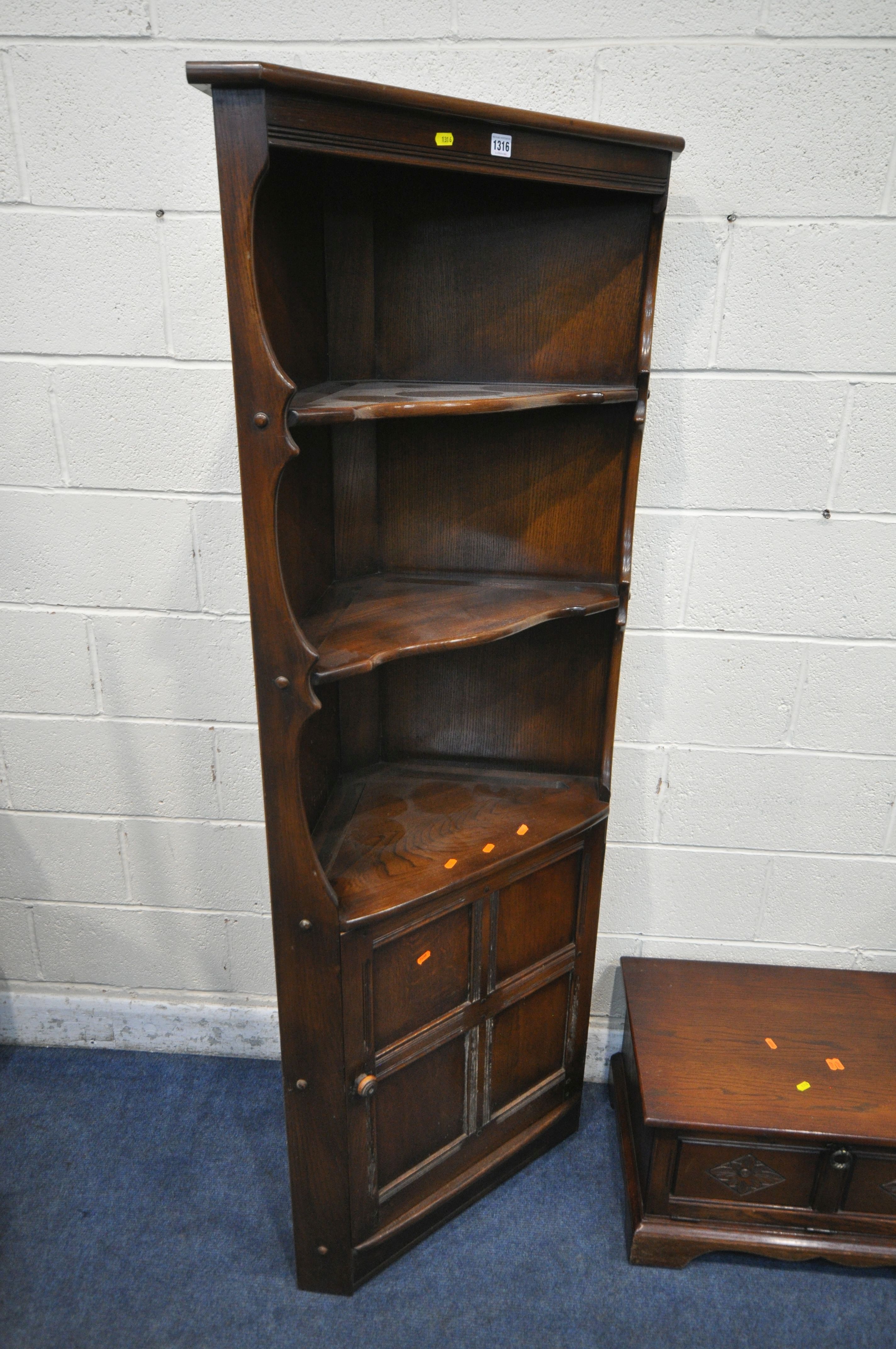 AN ERCOL ELM AND BEECH OLD COLONIAL CORNER CUPBOARD, width 76cm x depth 42cm x height 184cm, an - Image 2 of 3