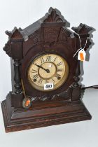 A AMERICAN MANTEL CLOCK, made by The Ansonia Clock Company - New York, a stained pine, striking gong