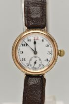 A GENTS 9CT GOLD, EARLY 20TH CENTURY TRENCH WATCH, manual wind, round white dial, Arabic numerals,