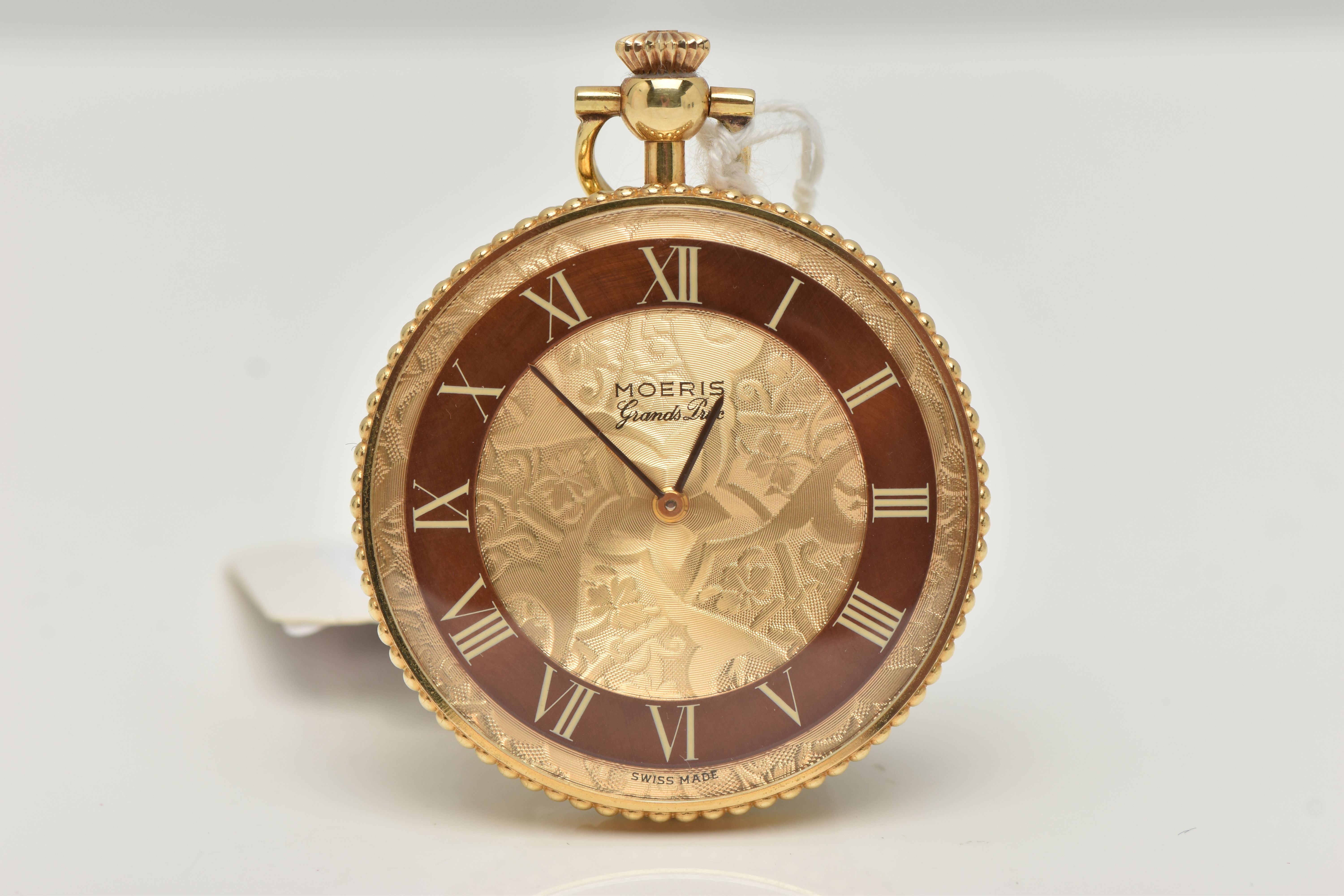 A MOERIS OPEN FACE POCKET WATCH, the decorative face with Roman numerals, face stamped Moeris