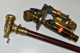 A REPRODUCTION WALKING CANE FITTED WITH BRASS TELESCOPE, length with telescope open 92cm, together