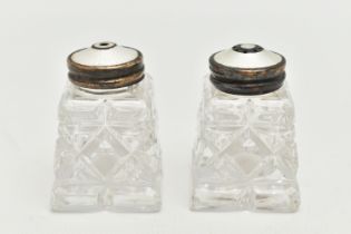 A PAIR OF NORWEGIAN SALT AND PEPPER SHAKERS, two glass shakers, fitted with white metal and white