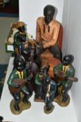 A GROUP OF EIGHT CERAMIC JAZZ MUSICIANS, comprising bass player, trumpet player, two guitarists (one