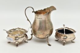 THREE ITEMS OF EARLY 20TH CENTURY SILVERWARE, to include a cream jug with scalloped edging,