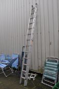 A YOUNGMAN ALUMINIUM DOUBLE EXTENSION LADDER with thirteen rungs to each 350cm length along with a