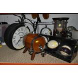 A GROUP OF ORNAMENTS, comprising two contemporary clocks, a boxed set of Cascada decorative spheres,