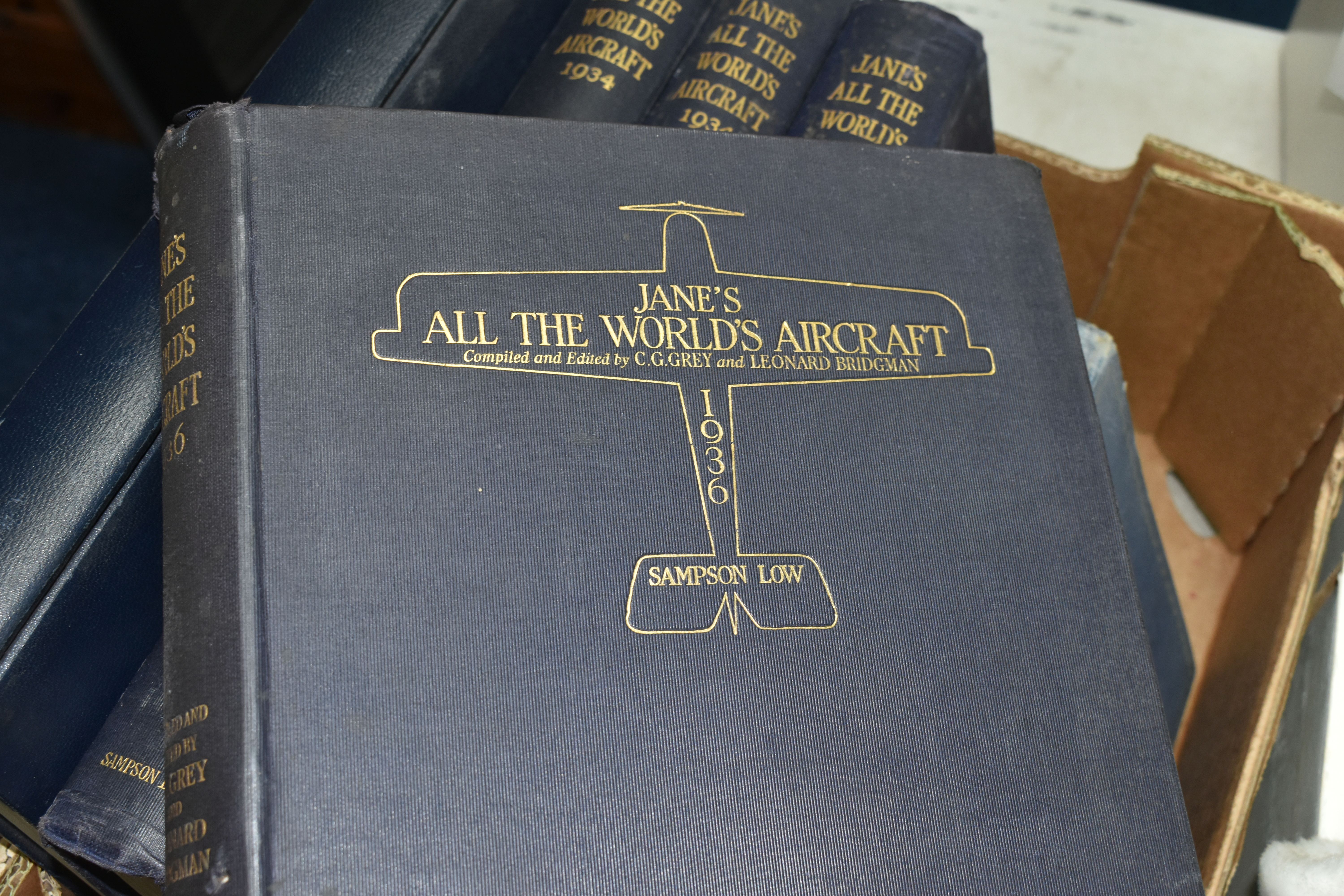 ONE BOX OF BOOKS containing six titles on the subject of Aircraft, four volumes of Jane's All The - Image 3 of 7