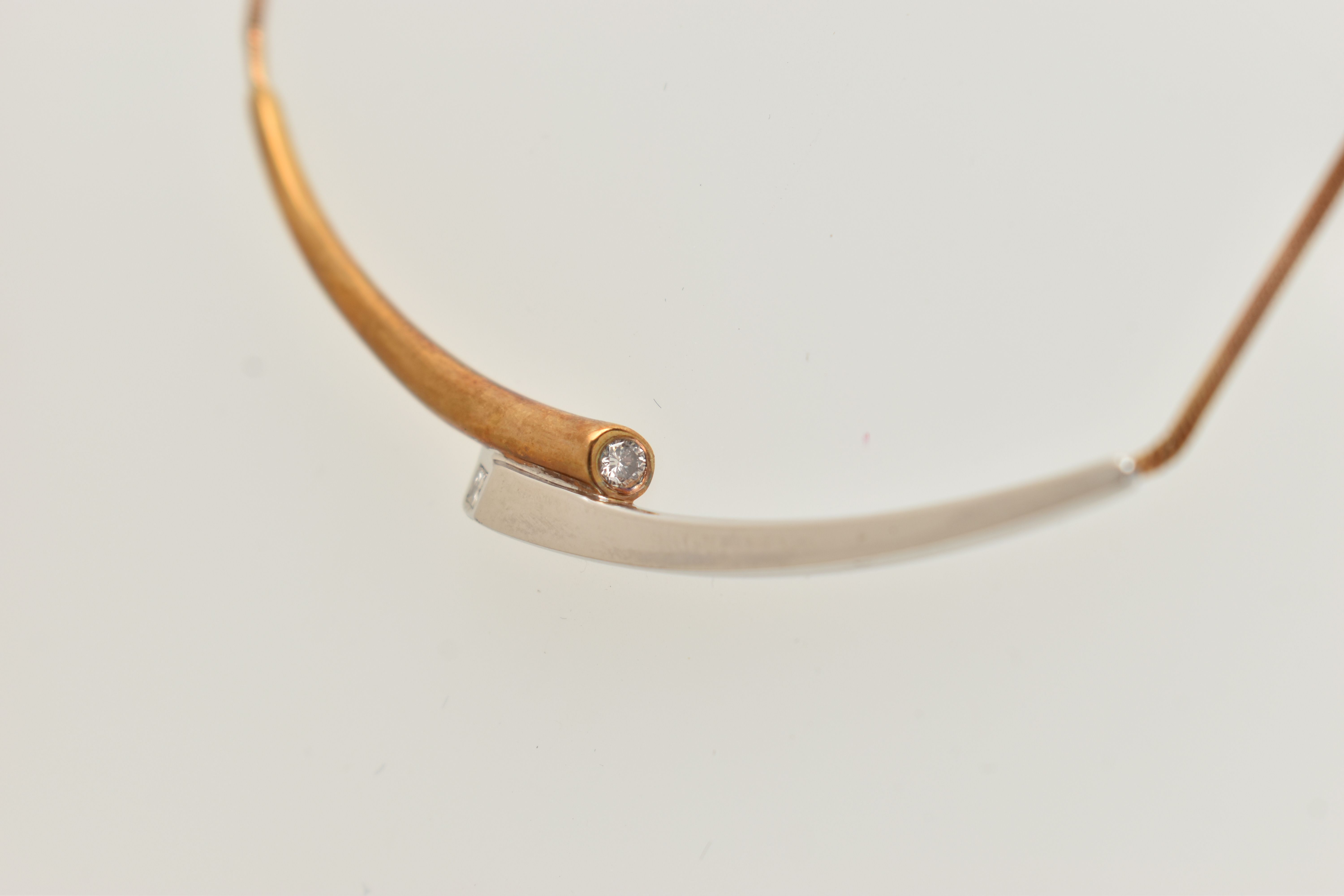 A 9CT GOLD 'ROYAL MINT' 'CONNECTIONS COLLARETTE' NECKLACE, a bicolor bypass style necklace, flush - Image 5 of 8