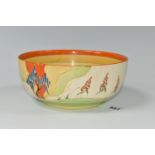 A CLARICE CLIFF 'WINDBELLS' DESIGN BOWL, with a vibrant orange, yellow, green and cream banding on