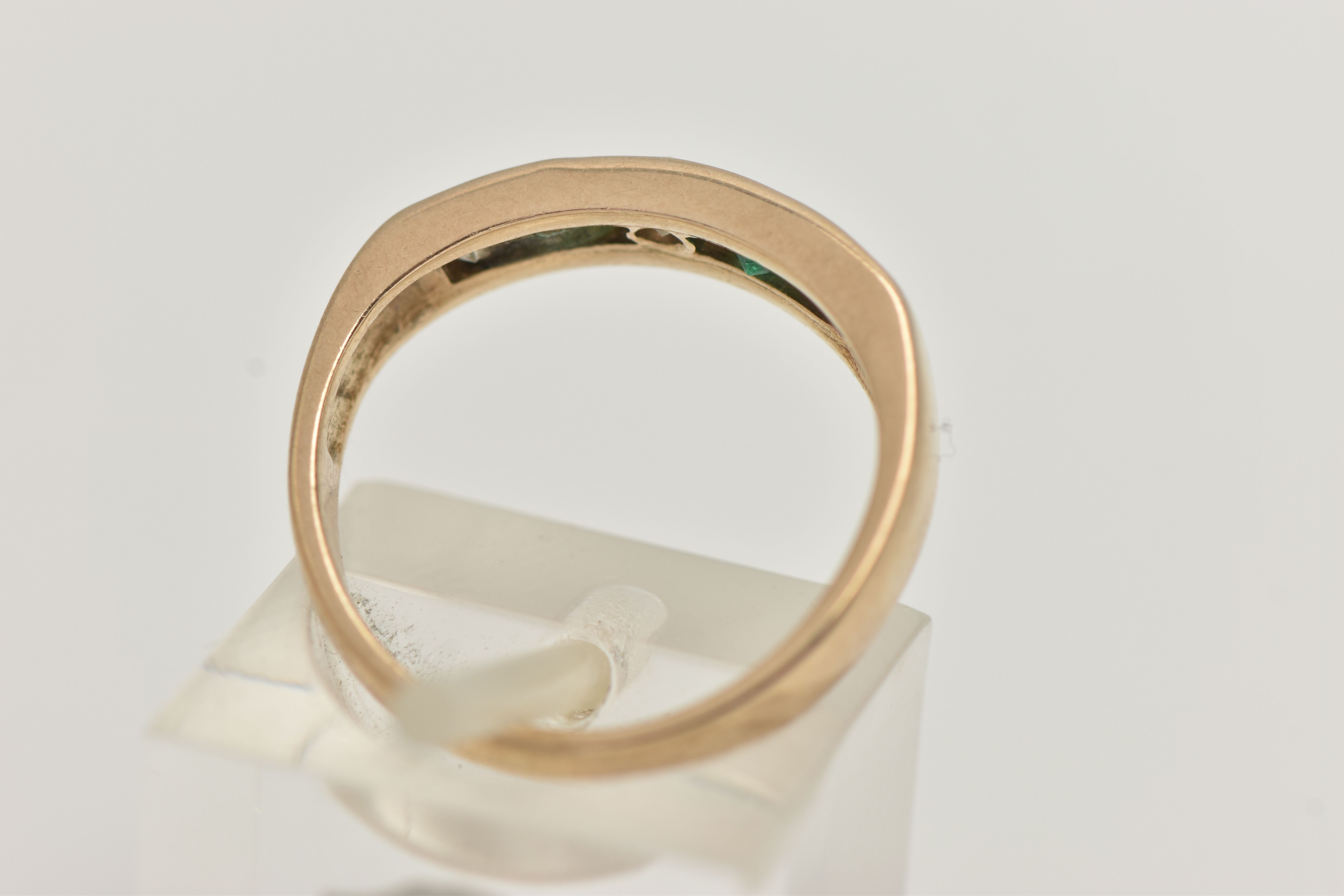 A 9CT GOLD EMERALD AND DIAMOND HALF ETERNITY RING, set with three round brilliant cut diamonds, - Image 3 of 4