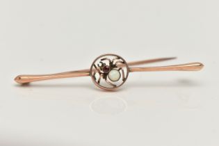 A ROSE METAL SPIDER BAR BROOCH, central spider set with an opal cabochon and circular cut paste body