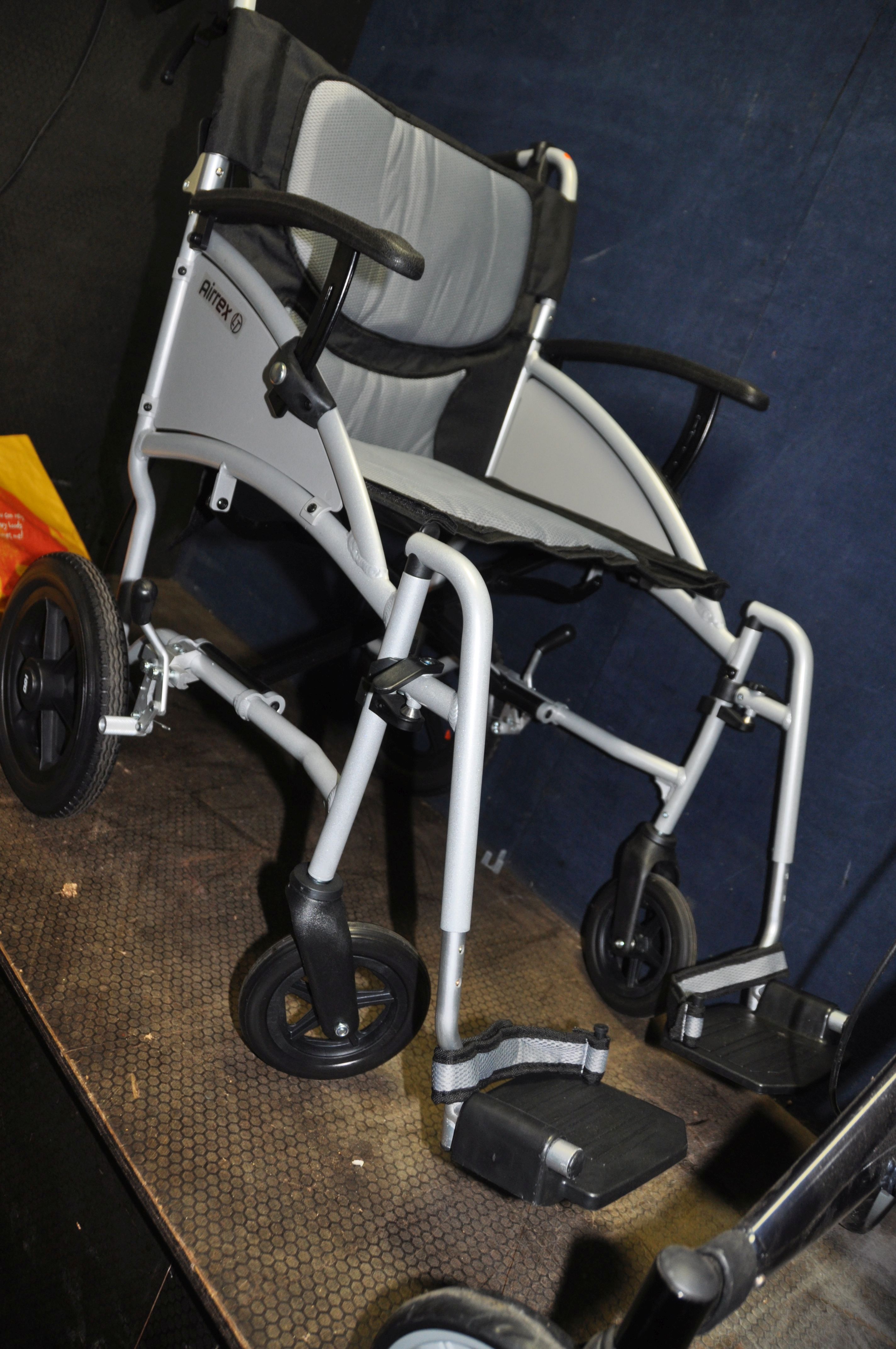 AN AIREX LT LIGHTWEIGHT FOLDING WHEEL CHAIR with two footrests and an unbranded travelator (2) - Image 2 of 3