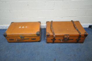 A LARGE TANNED LEATHER TRAVELING TRUNK, with twin handles and securing straps, width 93cm x depth